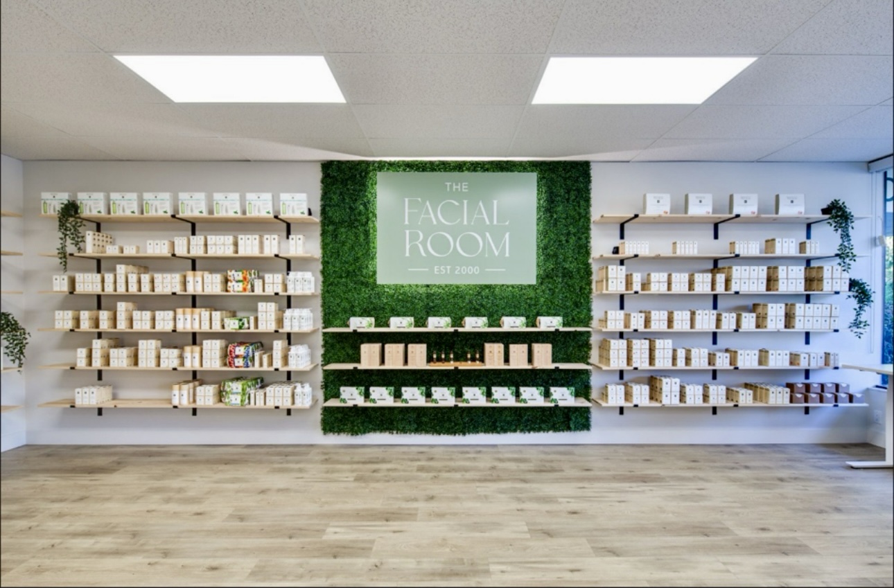 Finished retail interior build-out with feature wall and custom shelving