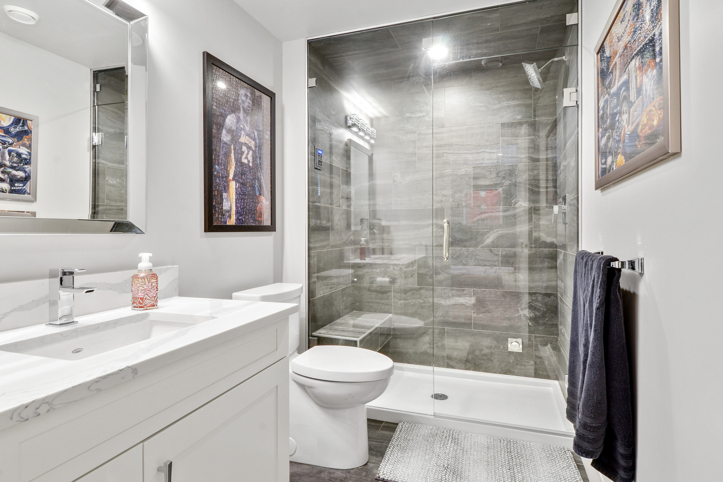 Bathroom renovation with tiled walk-in glass shower